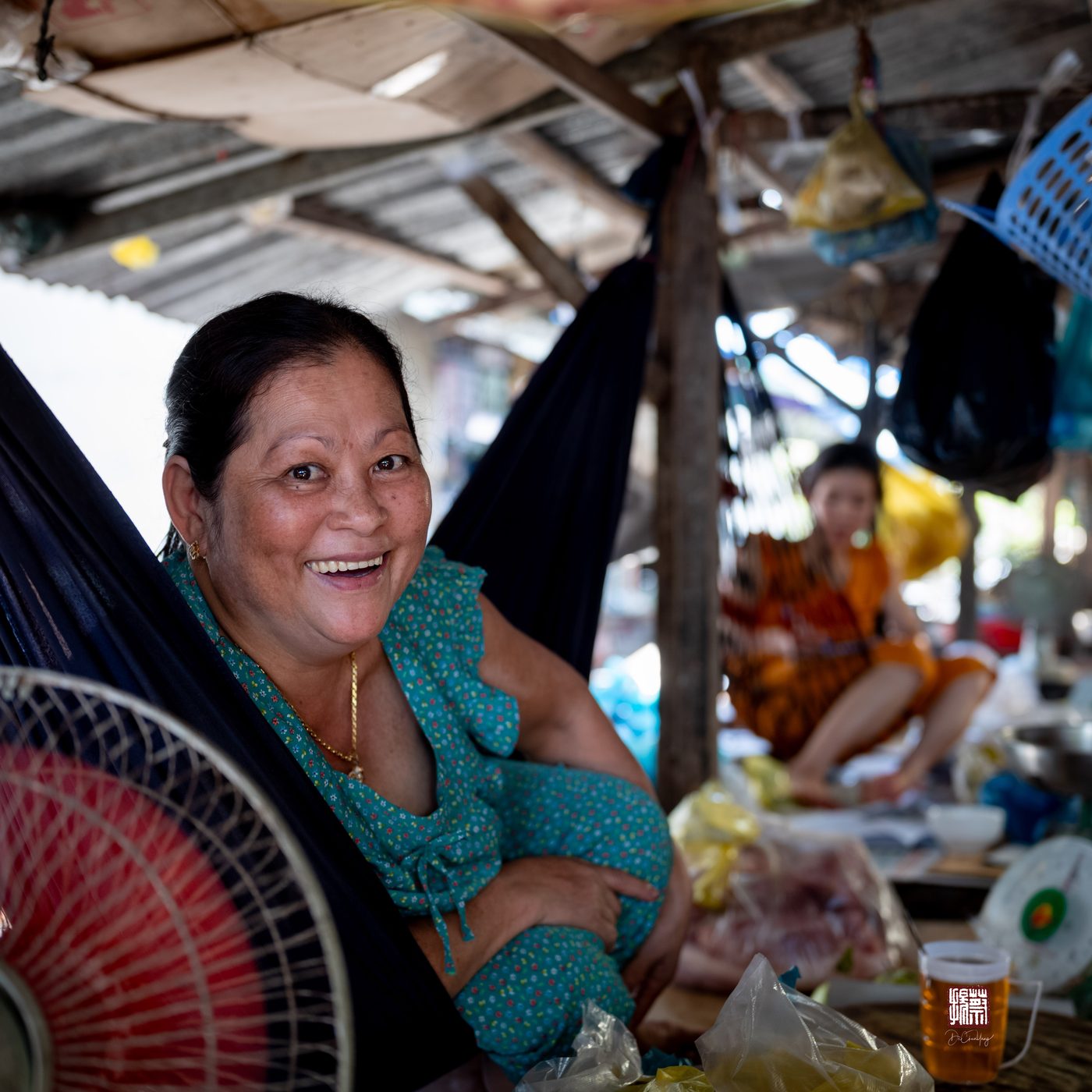 Fishmonger at Can Tho market, Vietnam, 2023